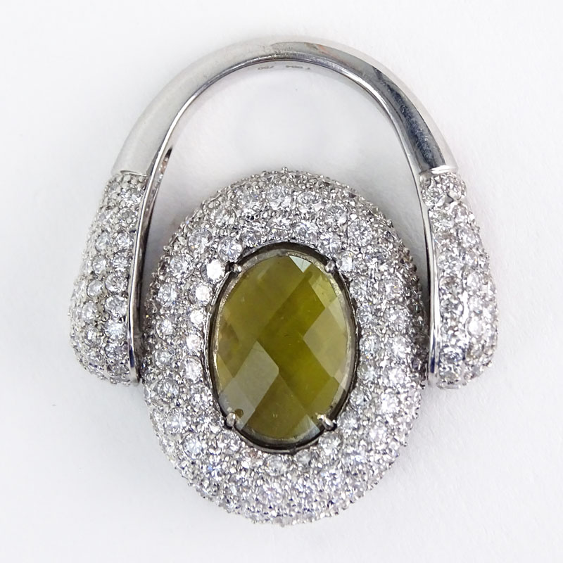 Approx. 4.44 Carat Pave Set Diamond, 3.39 Carat Pave Set Round Black Diamond, 8.46 Carat Oval Cut Citrine and 18 Karat White Gold Reversible Ring. 