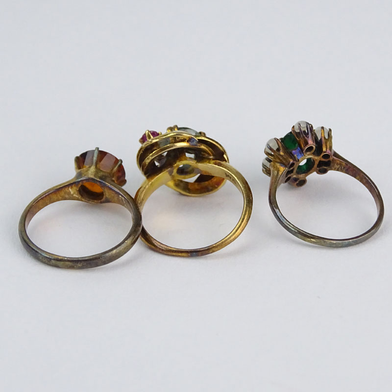 Three (3) Vintage 14 Karat Yellow Gold and Gemstone Rings Including Emerald, Citrine and Aquamarine.