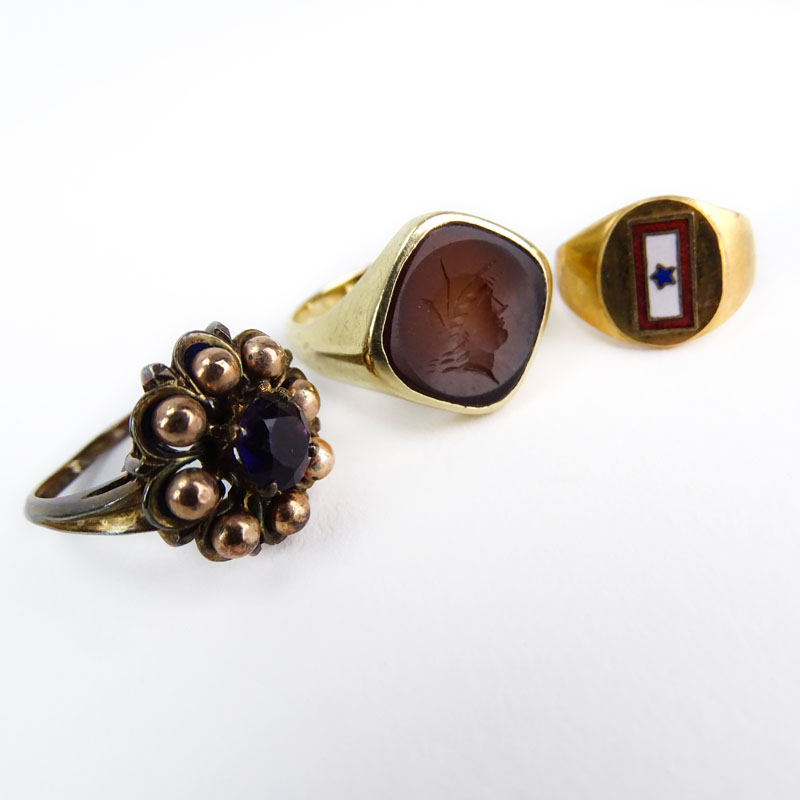 Three (3) Vintage 10 Karat Yellow Gold Rings Including Carved Carnelian, Amethyst and Enamel. 