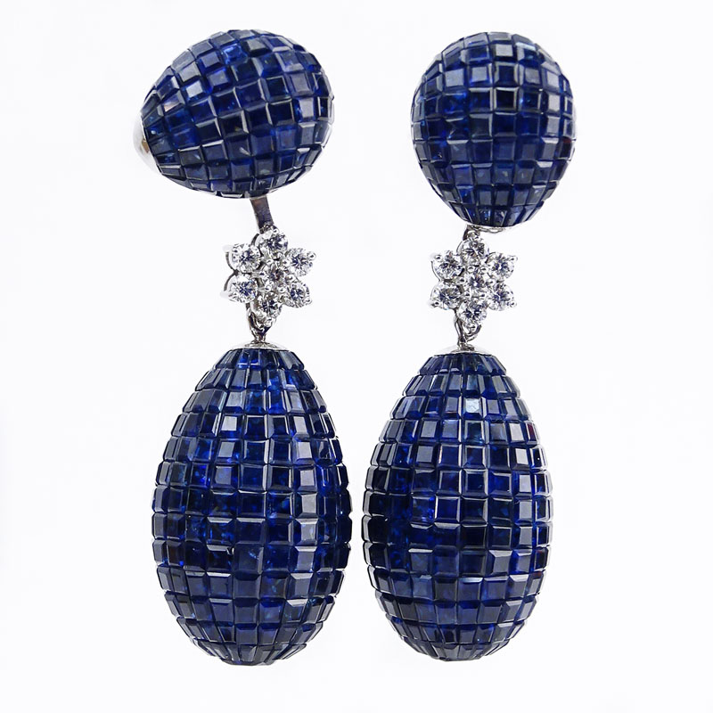 Contemporary Approx. 84.09 Carat Invisible Set Sapphire, .86 Carat Diamond and 18 Karat White Gold Pendant Earrings with Detachable Pendant.