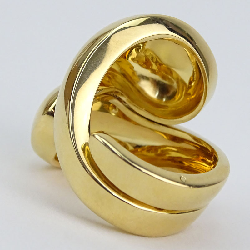 Cartier Carmelo Ying Yang 18 Karat Yellow Gold Curved Band Ring.