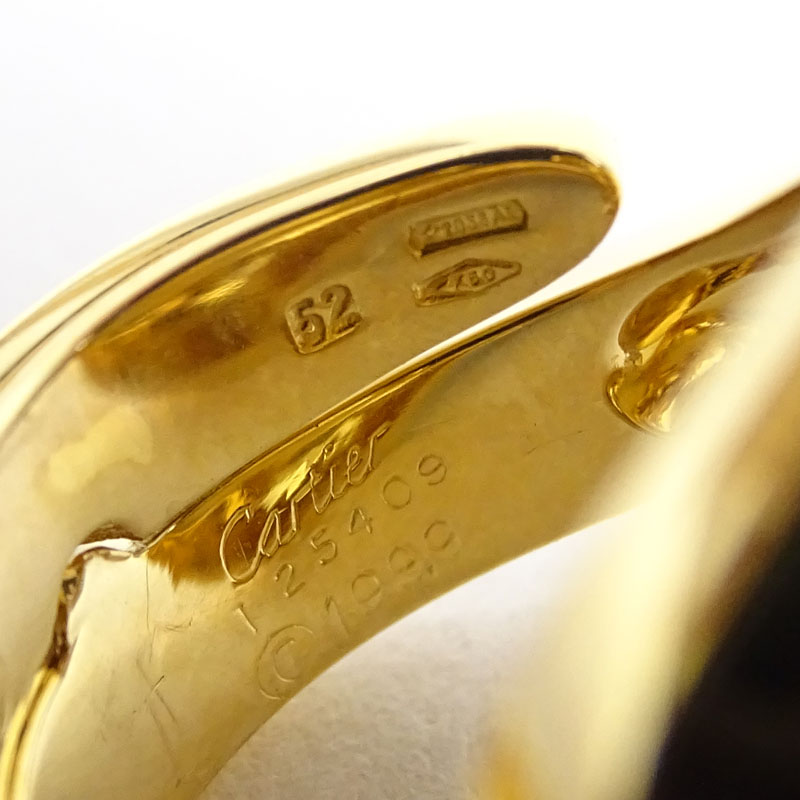 Cartier Carmelo Ying Yang 18 Karat Yellow Gold Curved Band Ring.