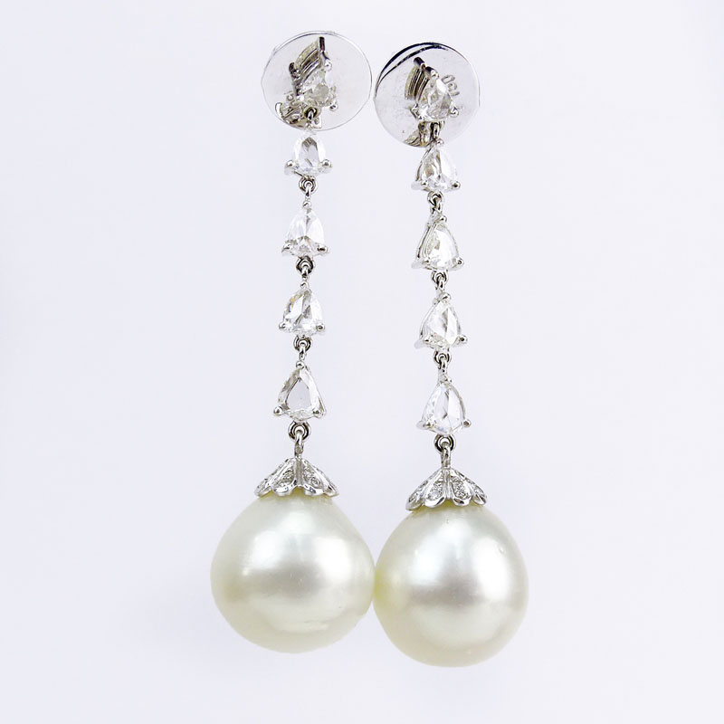 Contemporary South Sea Pearl, 2.10 Carat Rose Cut Diamond and 18 Karat White Gold Pendant Earrings. Pearls measure 14mm. 