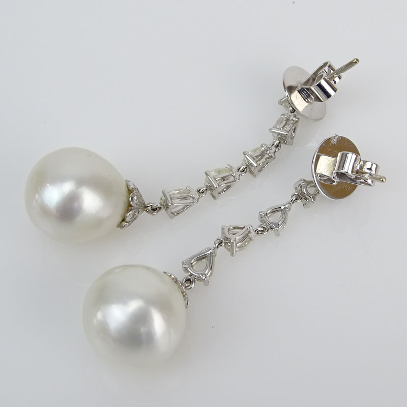 Contemporary South Sea Pearl, 2.10 Carat Rose Cut Diamond and 18 Karat White Gold Pendant Earrings. Pearls measure 14mm. 