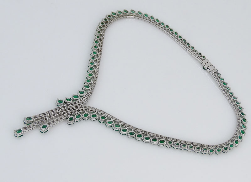 Contemporary Approx. 33.34 Carat Oval Cut Emerald, 14.02 Carat Baguette and Round Brilliant Cut Diamond and 18 Karat White Gold Necklace. 