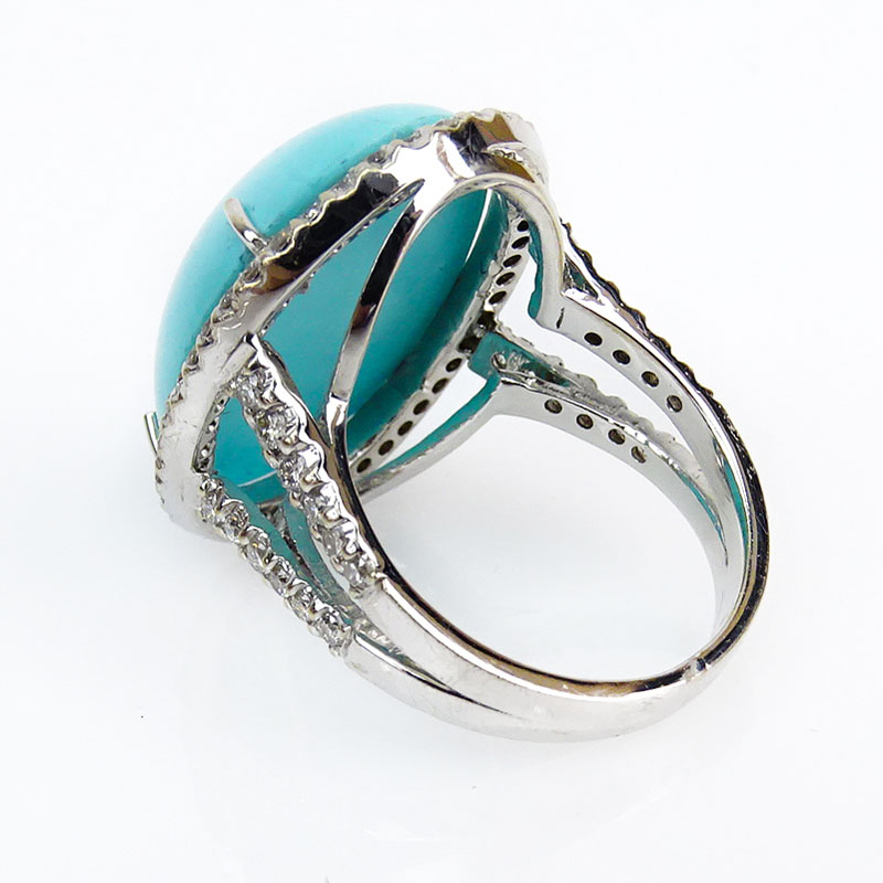 Contemporary Oval Cabochon Turquoise, 1.05 Carat Round Brilliant Cut Diamond and 18 Karat White Gold Ring. 