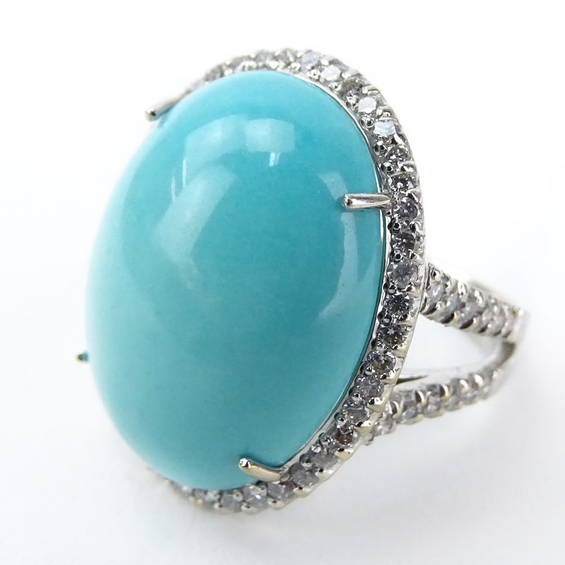 Contemporary Oval Cabochon Turquoise, 1.05 Carat Round Brilliant Cut Diamond and 18 Karat White Gold Ring. 