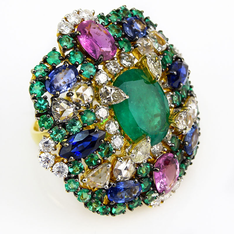 Contemporary Approx. 7.28 Carat Emerald, 5.92 Carat Multi Color Sapphire, 3.83 Carat Diamond and 18 Karat Yellow Gold Ring. 