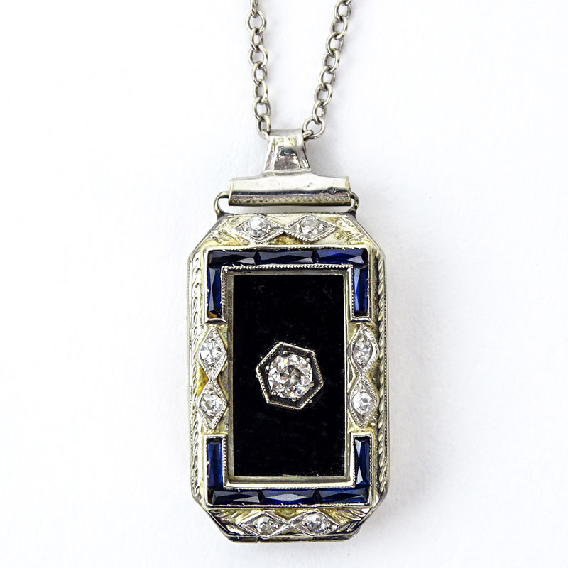 Assembled Art Deco Diamond, Sapphire, Black Onyx and 18 Karat White Gold Pendant (was once a watch) on 14 Karat White Gold Chain. 