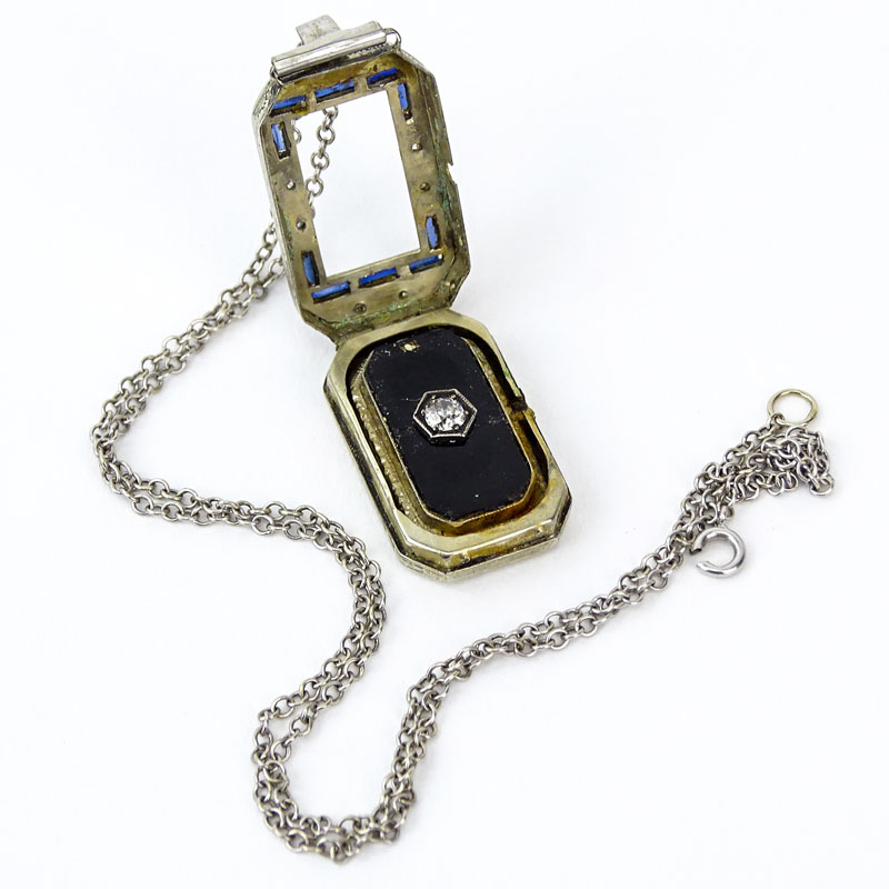 Assembled Art Deco Diamond, Sapphire, Black Onyx and 18 Karat White Gold Pendant (was once a watch) on 14 Karat White Gold Chain. 
