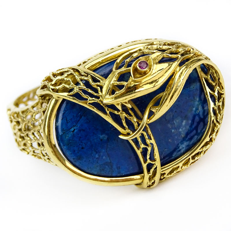 Vintage Ilias Lalaounis 18 Karat Yellow Gold and Lapis Lazuli Snake Design Hinged Bangle Bracelet with Ruby Eye.