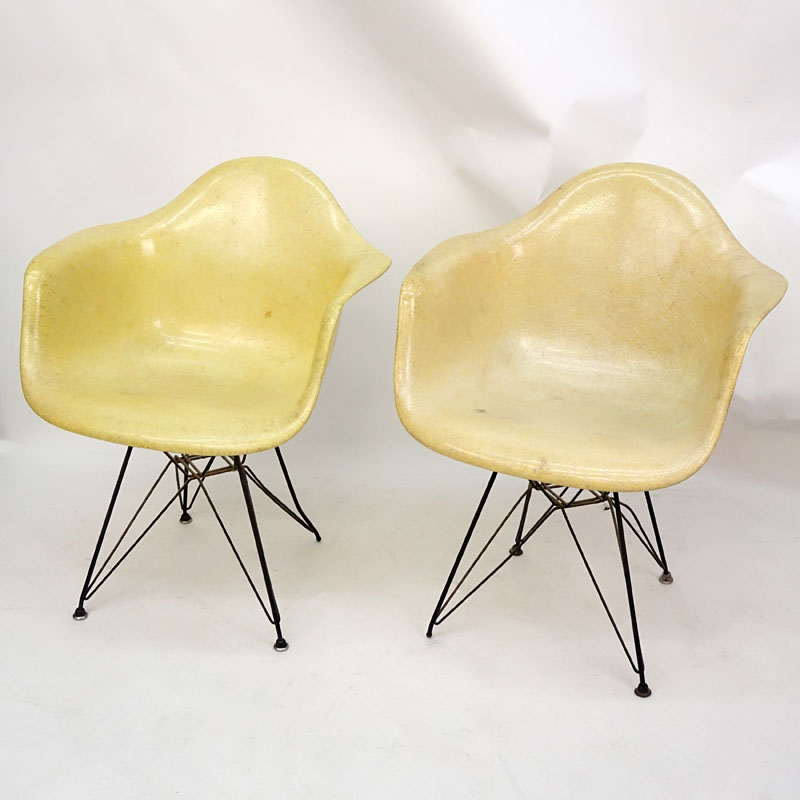 Pair of Eames for Herman Miller Molded Fiberglass Arm Chairs on Eiffel Tower Bases.