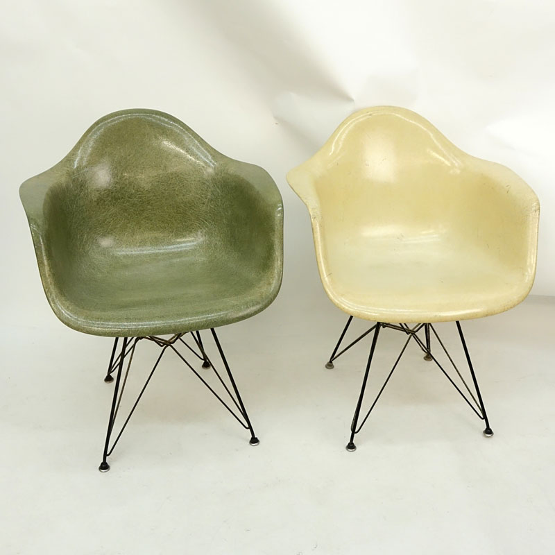 Pair of Eames for Herman Miller Molded Fiberglass Arm Chairs on Eiffel Tower Bases.