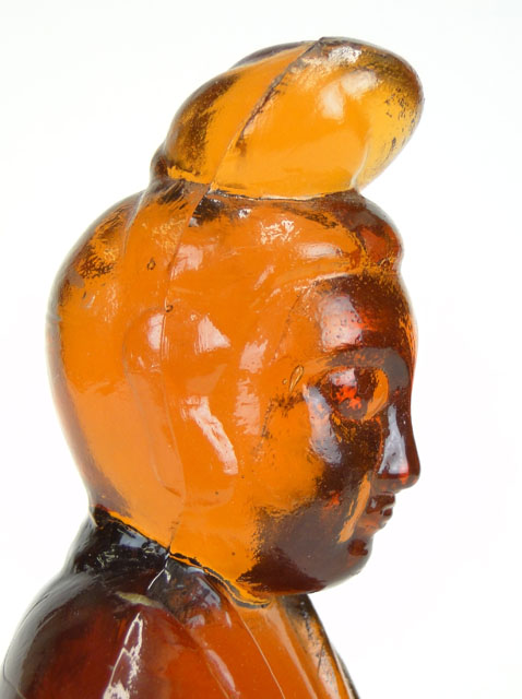 Probably American Amber Glass Figure of Guanyin with Ground Pontil.