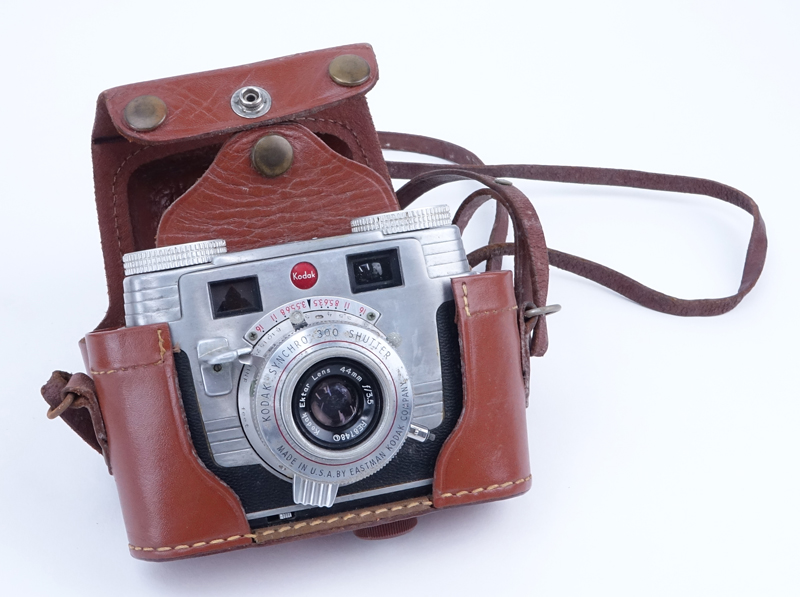 Grouping of Kodak Medalist II and Kodak Signet 35 Film Cameras in Leather Cover.