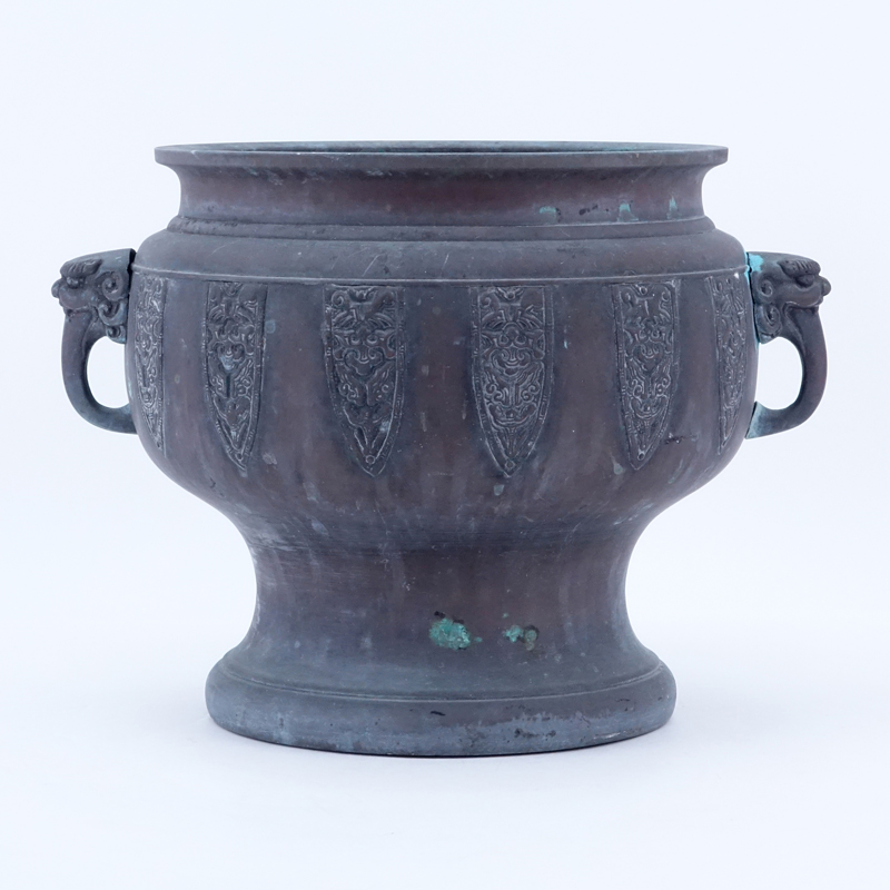 Chinese Archaic Style Bronze Urn with Foo Dog Handles.