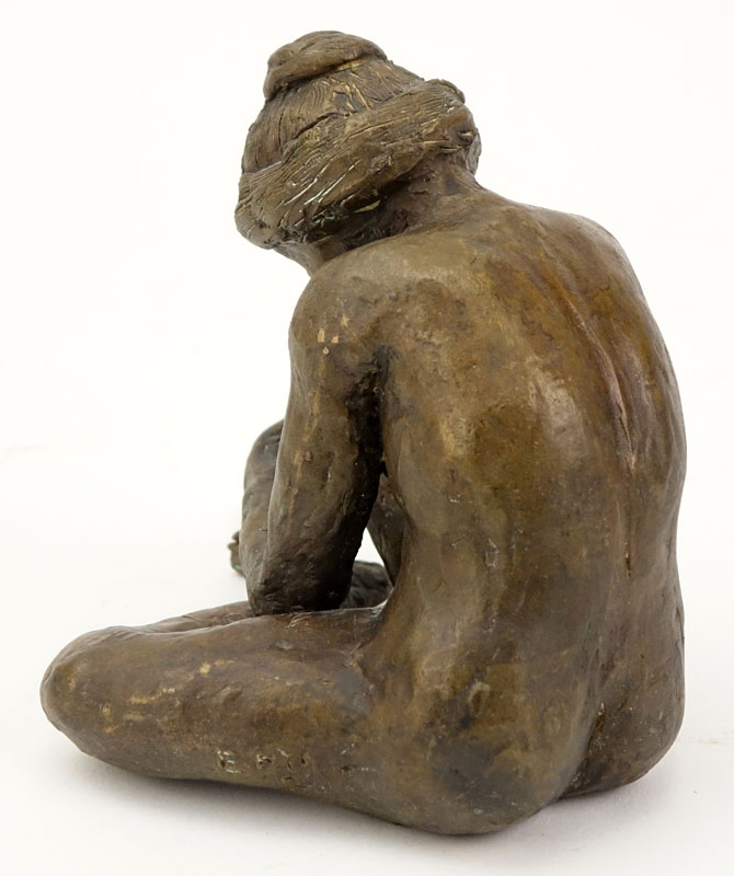 Modern Bronze Sculpture "Seated Woman". Signed E.M. 