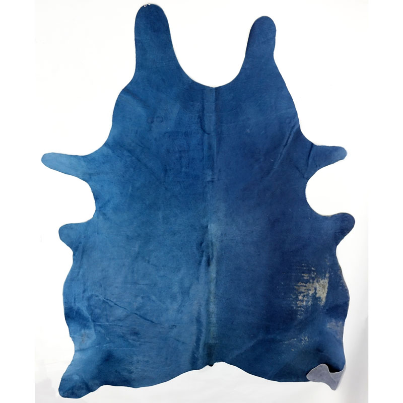 Modern Blue Cowhide Rug. Fading or wear to a section.