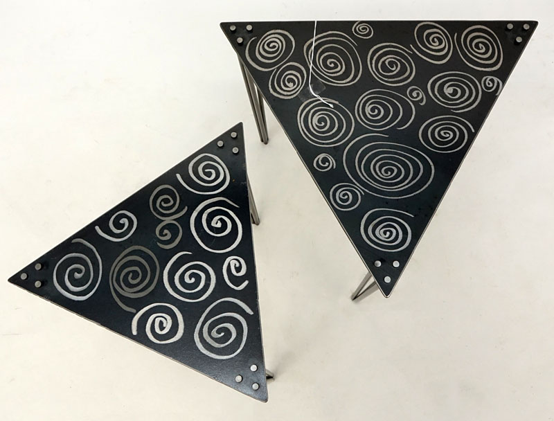 Two Contemporary Welded Steel Nesting Tables. Both with triangular shape and dremeled swirl design.