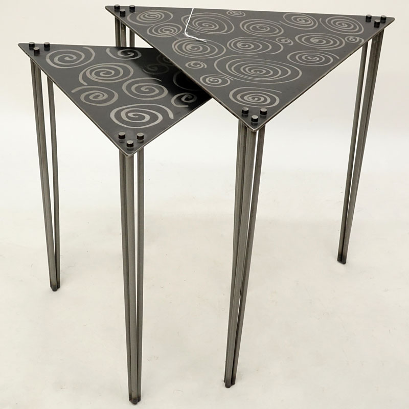 Two Contemporary Welded Steel Nesting Tables. Both with triangular shape and dremeled swirl design.