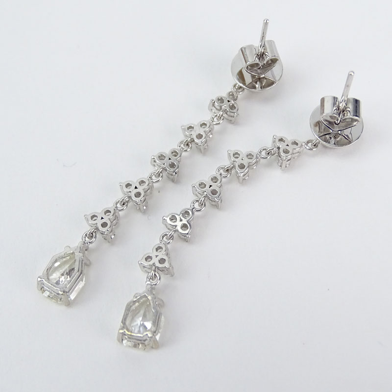 GIA Certified Approx. 3.15 Carat Pear Shape and Round Brilliant Cut Diamond and 14 Karat White Gold Chandelier Earrings.