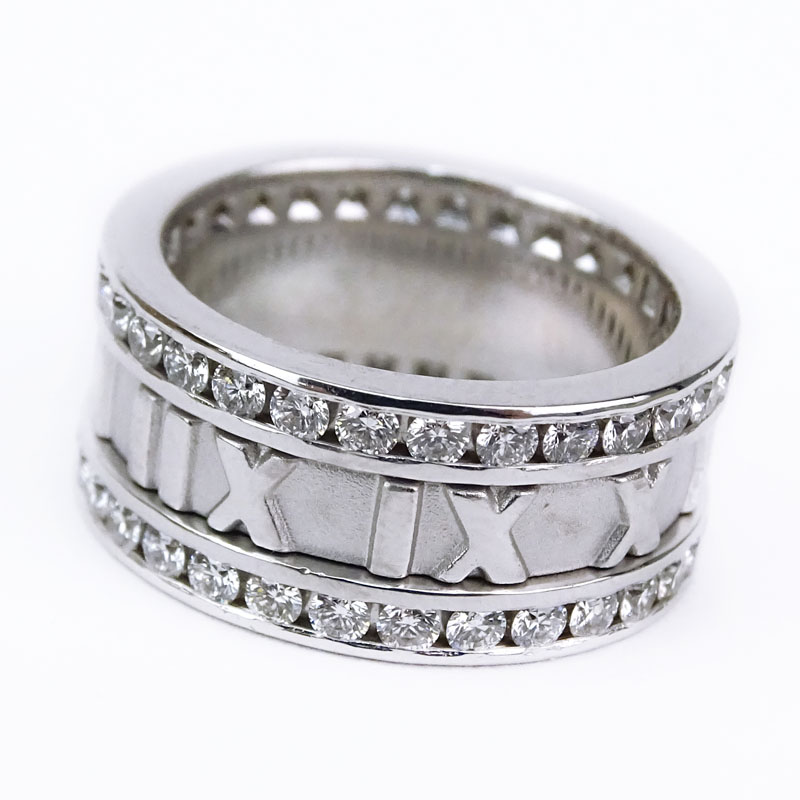 Tiffany & Co Approx. 1.50 Carat Round Brilliant Cut Diamond and 18 Karat White Gold Atlas Roman Numeral Band Ring.