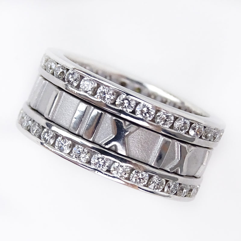 Tiffany & Co Approx. 1.50 Carat Round Brilliant Cut Diamond and 18 Karat White Gold Atlas Roman Numeral Band Ring.