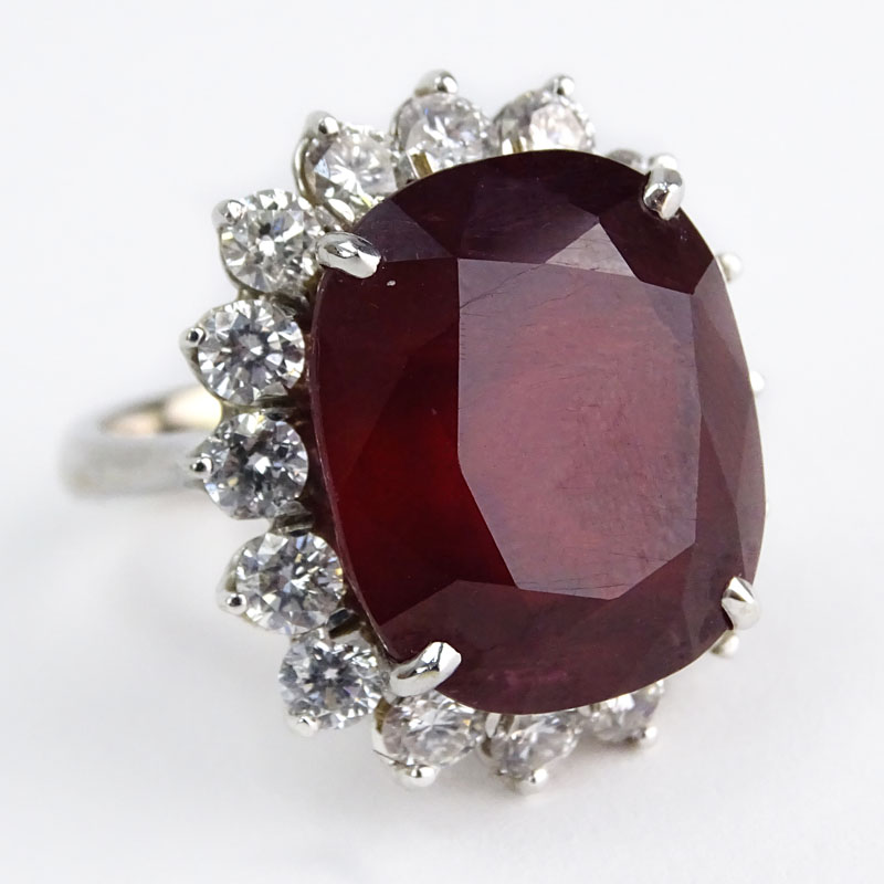 Vintage Large Oval Cut Ruby, Round Brilliant Cut Diamond and 18 Karat White Gold Ring. 