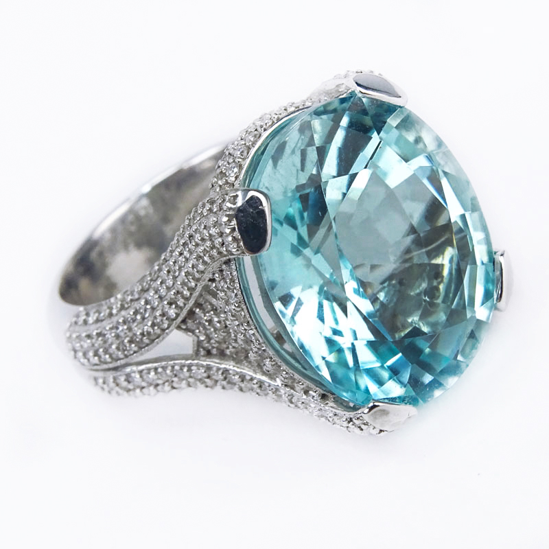 18.7 Carat Paraiba Tourmaline 2.5 Carat Diamond 18 Karat Gold Designer's Ring. Rare EGL and BHGL Certified 18.7 Carat Oval Cut Mozambique Paraiba Tourmaline, 2.5 Carat Pave Set Diamond and 18 Karat White Gold Ring. 