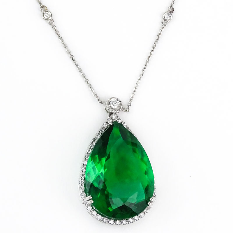 Approx. 23.93 Carat Pear Shape Green Stone, .65 Carat Diamond and 14 Karat White Gold Pendant Necklace. 