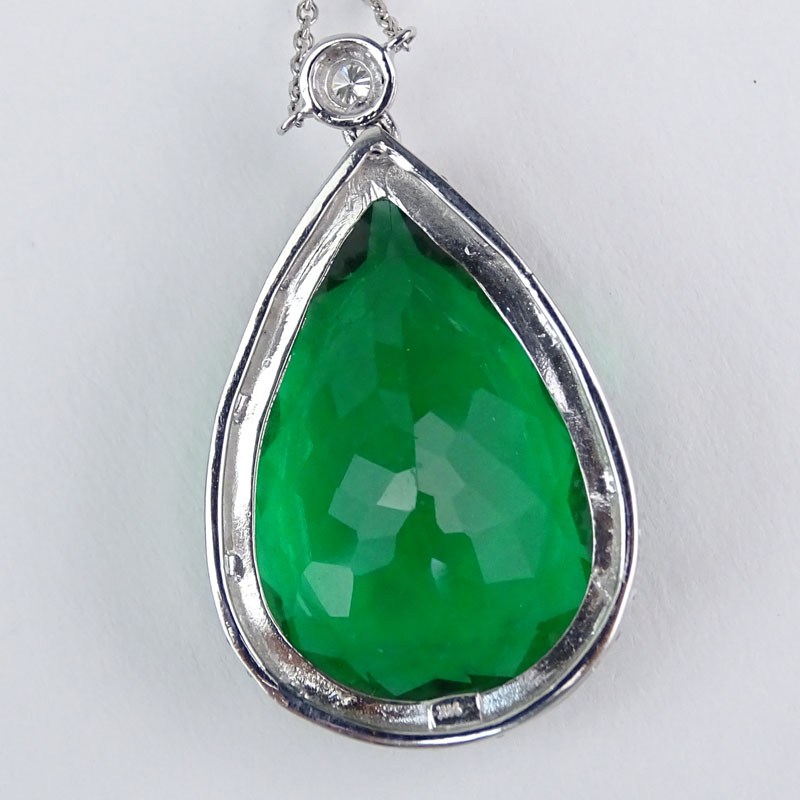 Approx. 23.93 Carat Pear Shape Green Stone, .65 Carat Diamond and 14 Karat White Gold Pendant Necklace. 