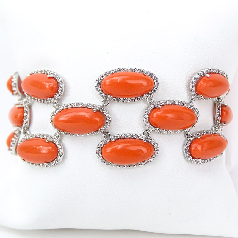 Approx. 5.85 Carat Diamond, Cabochon Red Coral and 18 Karat White Gold Bracelet. Stamped 18K. Very good condition.