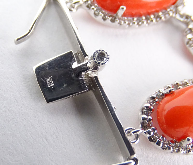Approx. 5.85 Carat Diamond, Cabochon Red Coral and 18 Karat White Gold Bracelet. Stamped 18K. Very good condition.