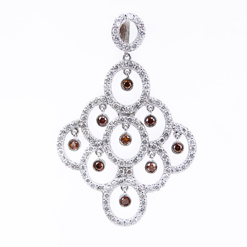 Approx. 1.62 Carat Pave Set Round Brilliant Cut Diamond, .29 Carat Brown Diamond and 14 Karat White Gold Pendant. 