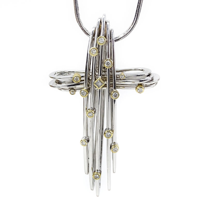 Modern Design 14 Karat White and Yellow Gold and Diamond Cross Pendant with 18 Karat White Gold Chain.