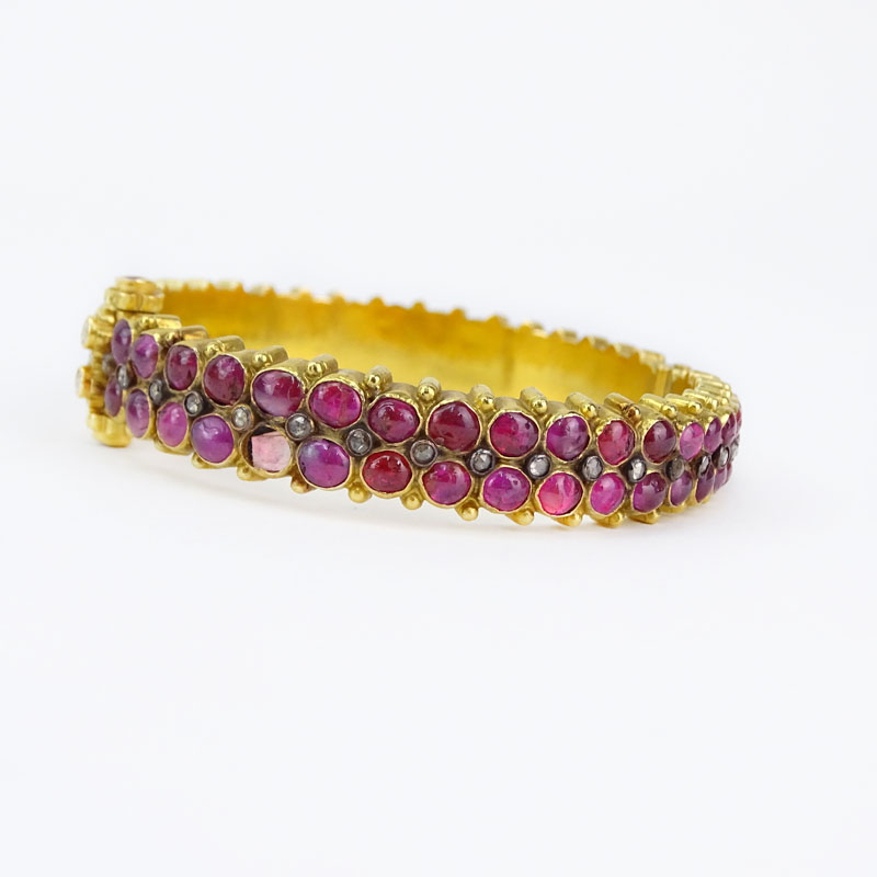 Approx. 22.50 Carat Cabochon Ruby, 1.0 Carat Rose Cut Diamond and 22 Karat Yellow Gold Hinged Bangle Bracelet. 