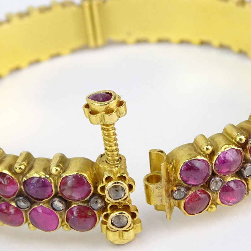 Approx. 22.50 Carat Cabochon Ruby, 1.0 Carat Rose Cut Diamond and 22 Karat Yellow Gold Hinged Bangle Bracelet. 