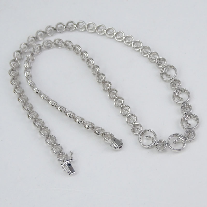 Approx. 1.0 Carat Micro Pave Set Round Brilliant Cut Diamond and 14 Karat White Gold Swirl Design Necklace.