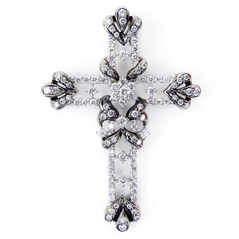 Approx. 1.28 Carat Round Brilliant Cut Diamond and 18 Karat White Gold Cross Pendant.