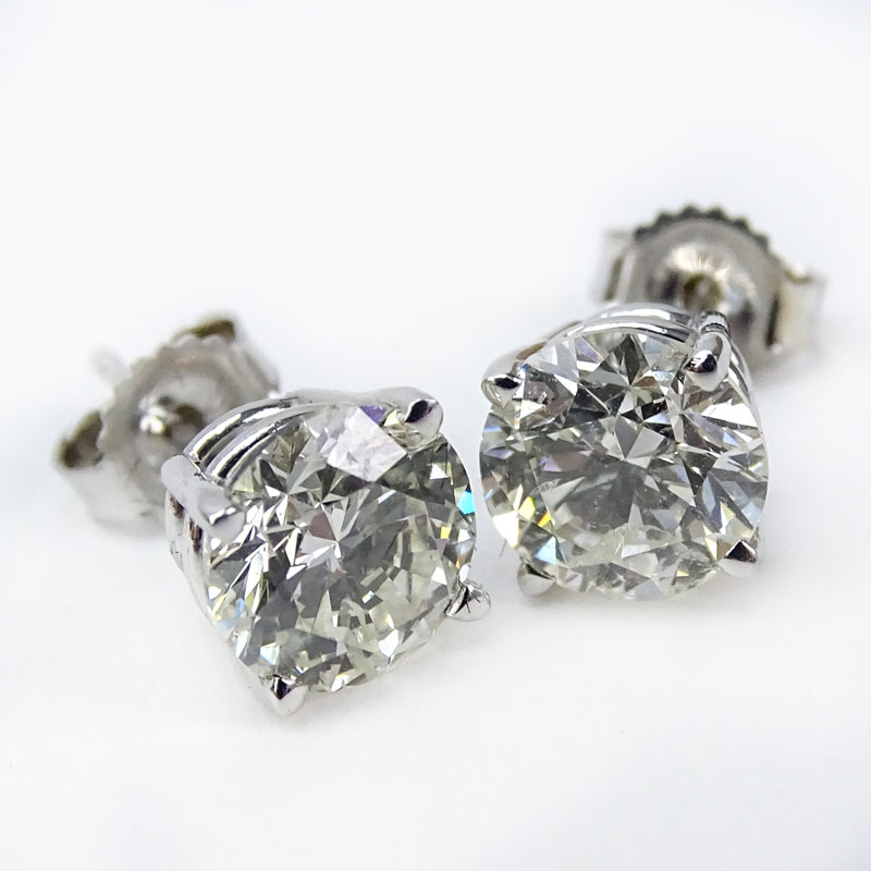 Approx. 2.01 Carat TW Round Brilliant Cut Diamond and 14 Karat White Gold Ear Studs.