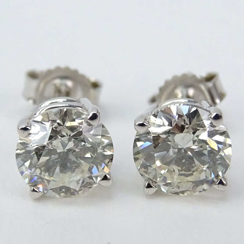 Approx. 2.01 Carat TW Round Brilliant Cut Diamond and 14 Karat White Gold Ear Studs.