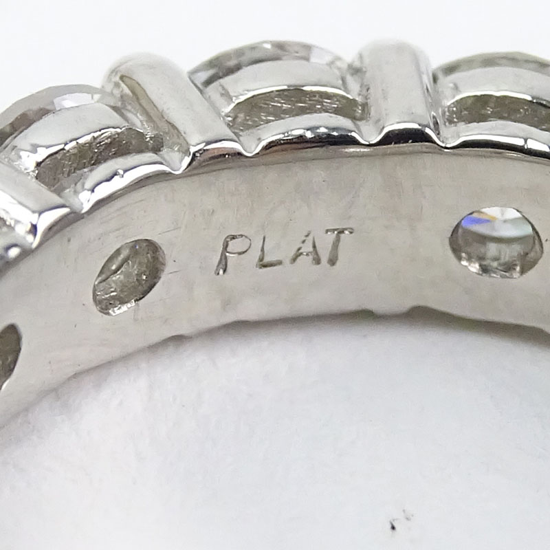 Approx. 5.02 Carat Round Brilliant Cut Diamond and Platinum Eternity Band.