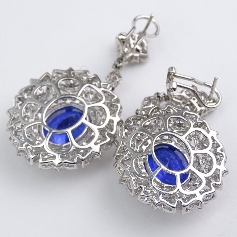 Approx. 12.0 Carat Oval Cut Tanzanite, 6.0 Carat Round Brilliant Cut Diamond and 18 Karat White Gold Pendant Earrings. 