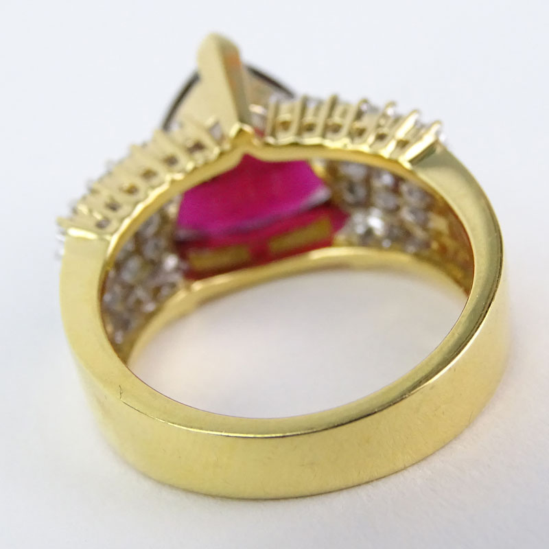 Vintage Rubelite Tourmaline, Baguette and Round Cut Diamond and 18 Karat Yellow Gold Ring. 