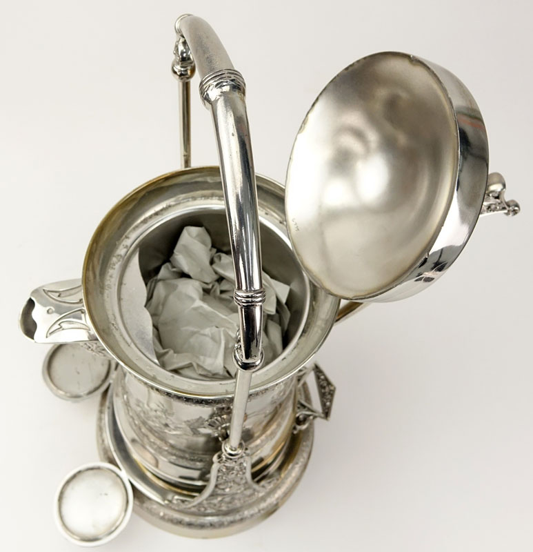 Antique Southington Co. Silver Plated Tilting Water Pitcher.