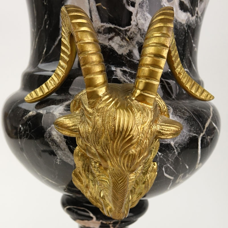 Large Neoclassical Style Black Marble Urn with Gilt Bronze Ram's Head Handles.