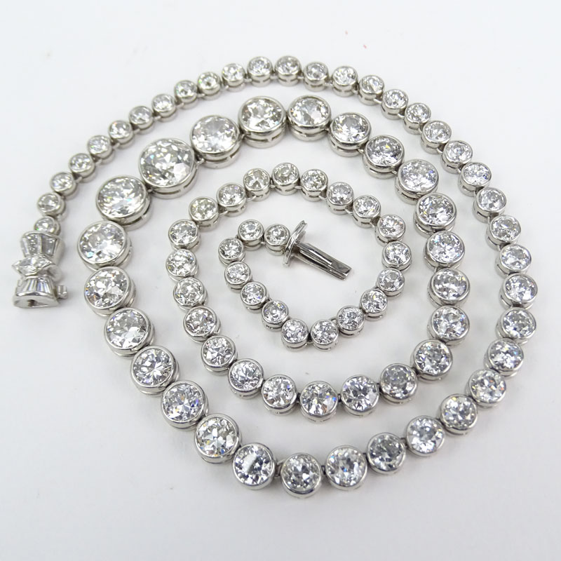 Vintage Approx. 41.0 Carat Bezel Set Graduated Round Brilliant Cut Diamond and Platinum Riviera Necklace, Diamonds F-H color, VS1-SI1 clarity.