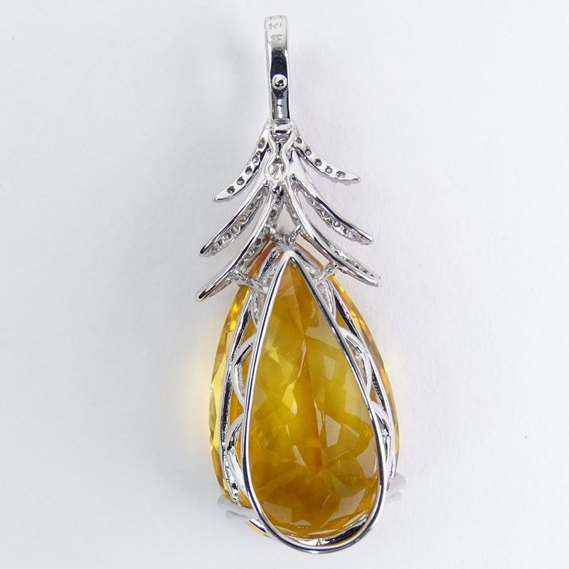 Large Pear Shape Citrine, Diamond and 14 Karat White Gold Pendant. 