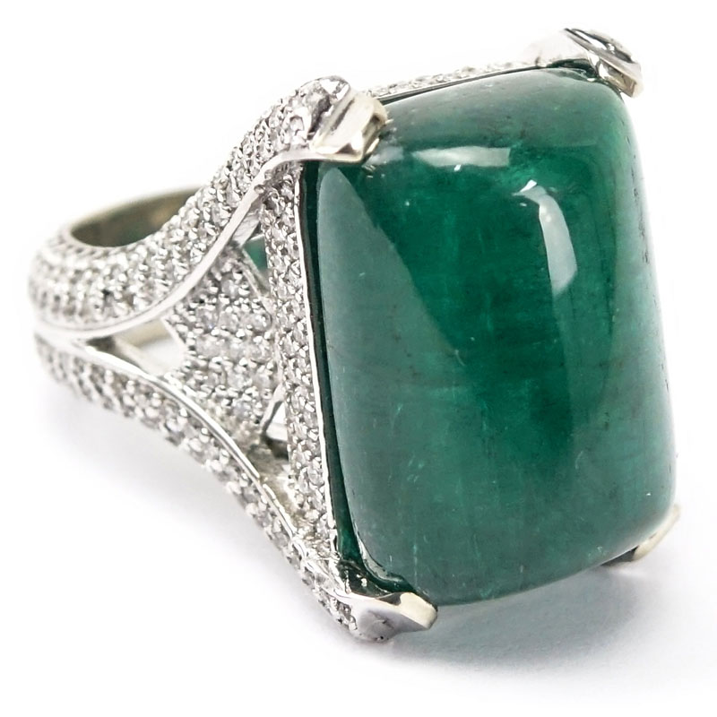 GIA Certified 25.59 Carat Sugarloaf Cabochon Emerald, Approx. 3.70 Carat Pave Set Diamond and 18 Karat White Gold Ring. 