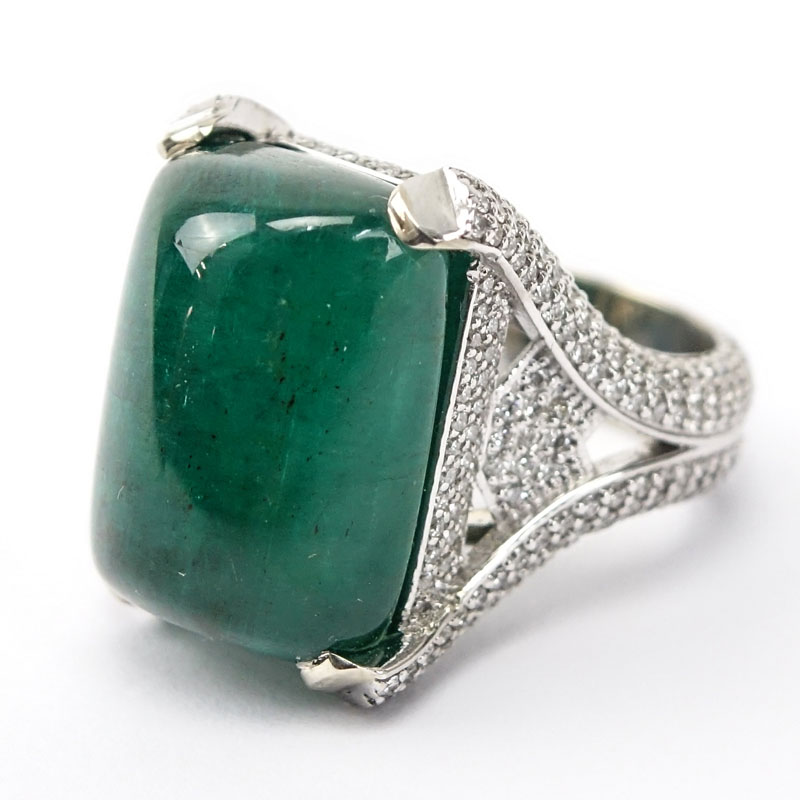 GIA Certified 25.59 Carat Sugarloaf Cabochon Emerald, Approx. 3.70 Carat Pave Set Diamond and 18 Karat White Gold Ring. 